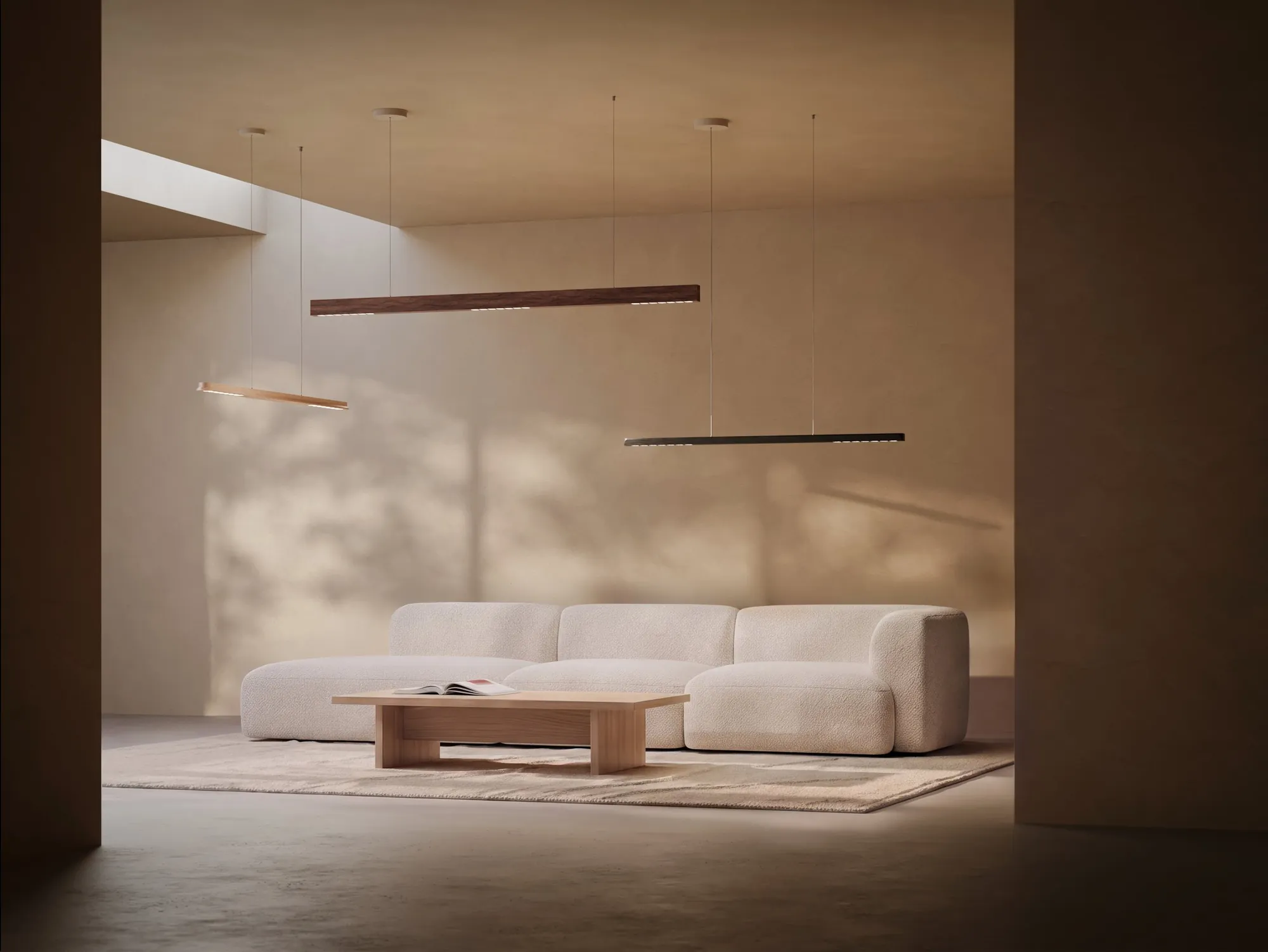 Focus Series pendant lights above a sofa in a warm interior